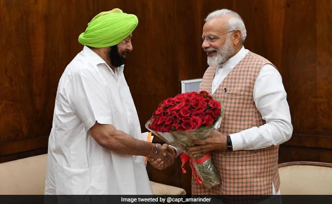 f1e7ns68 amarinder singh pm modi