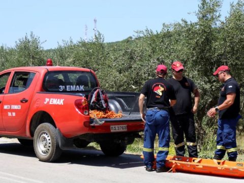 members of a search and rescue team of the fire brigade prepare to retrieve the body of a woman found near the village of kolimpari on the island of crete 2