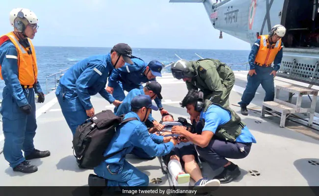 afp7om2o indian navy helping japan crew member