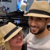 laura and aladin try on hats