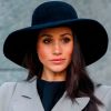 meghan markle with a very large hat