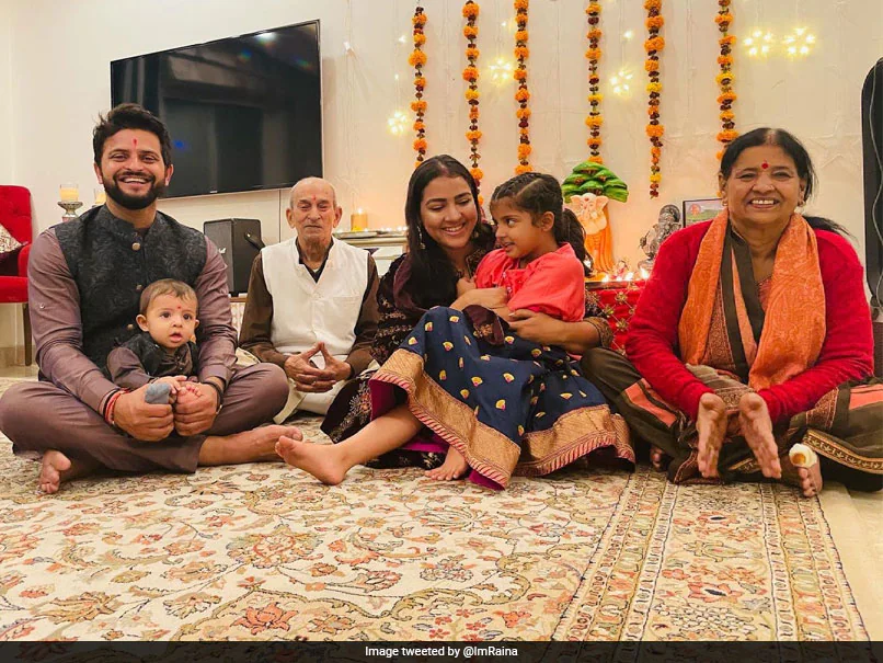 s259mev suresh raina with family