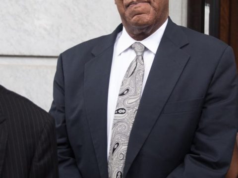 bill cosby in a suit