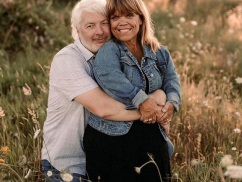 amy roloff and chris marek in a meadow